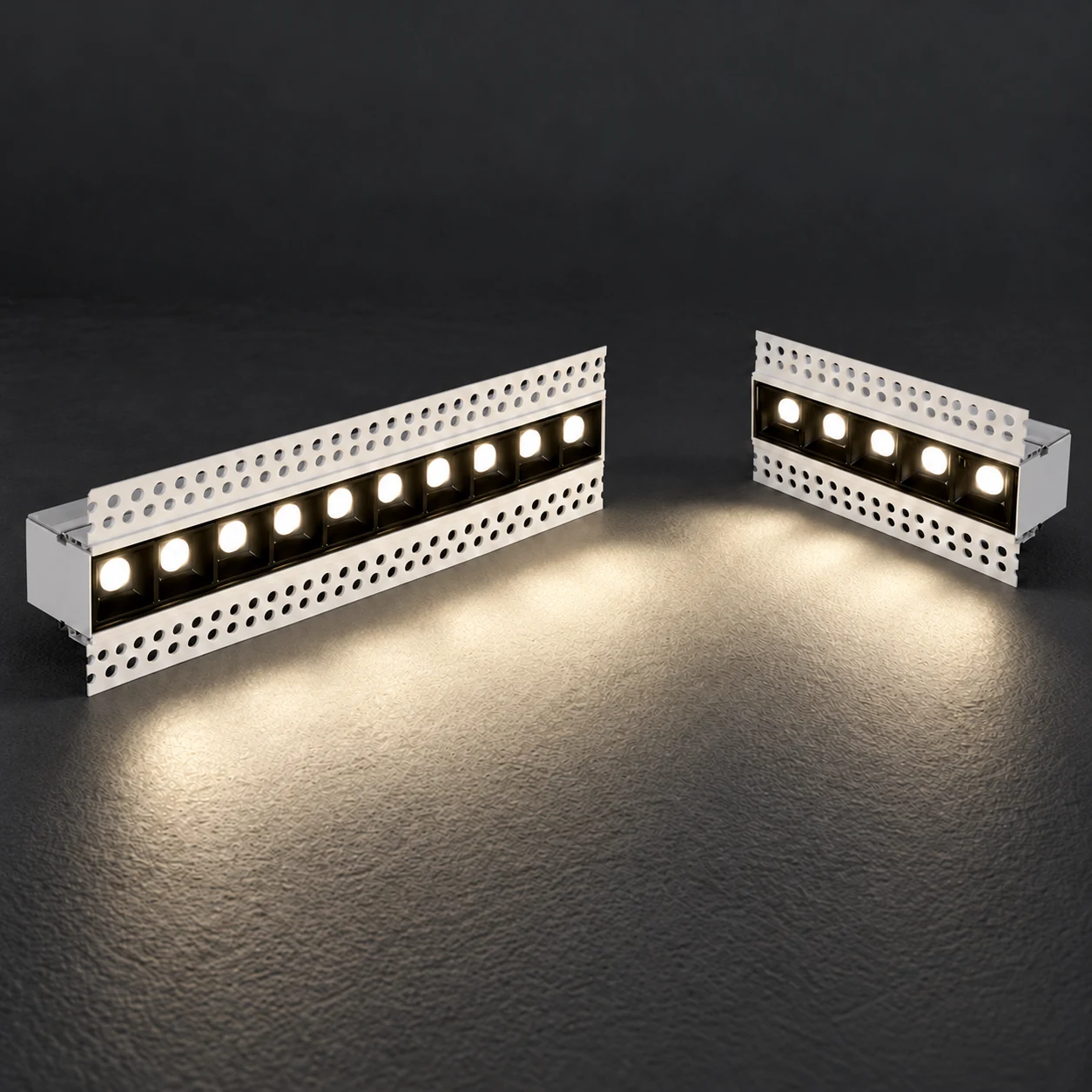 Five- and ten-cell trimless linear downlights with perforated mounting wings