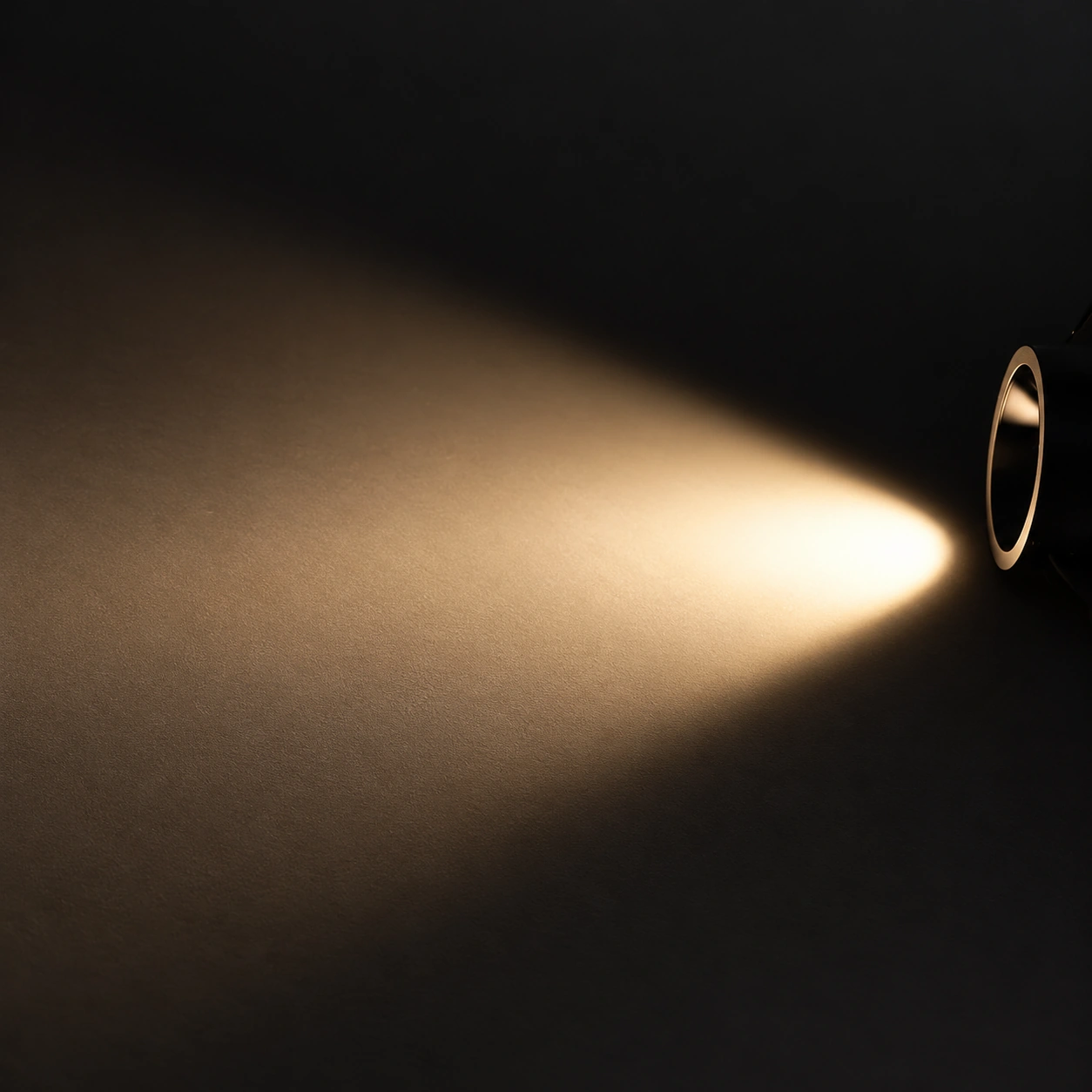 single recessed spotlight warm beam charcoal detail